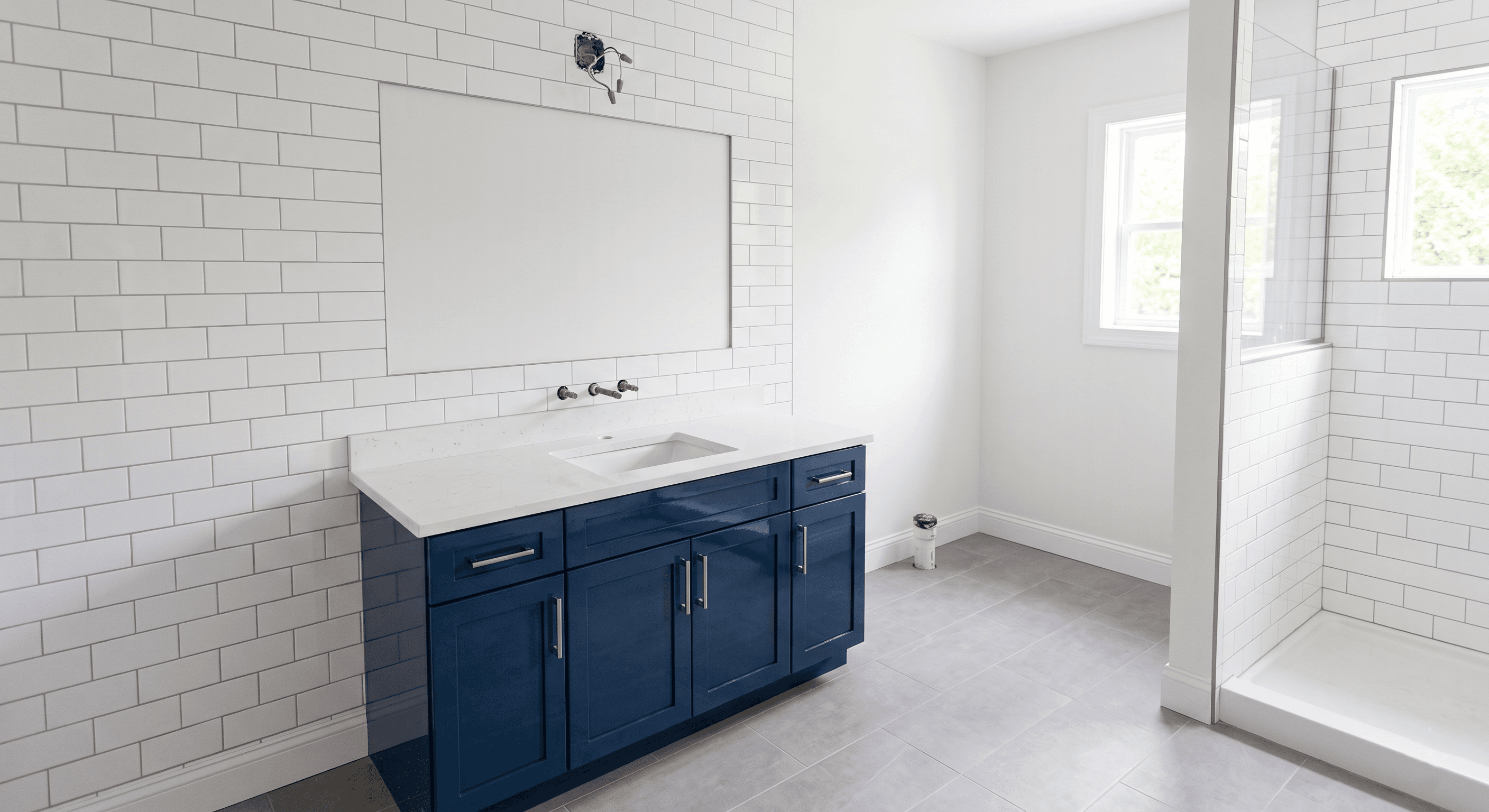 Vacant bathroom after post-construction cleaning with dust and debris removed
