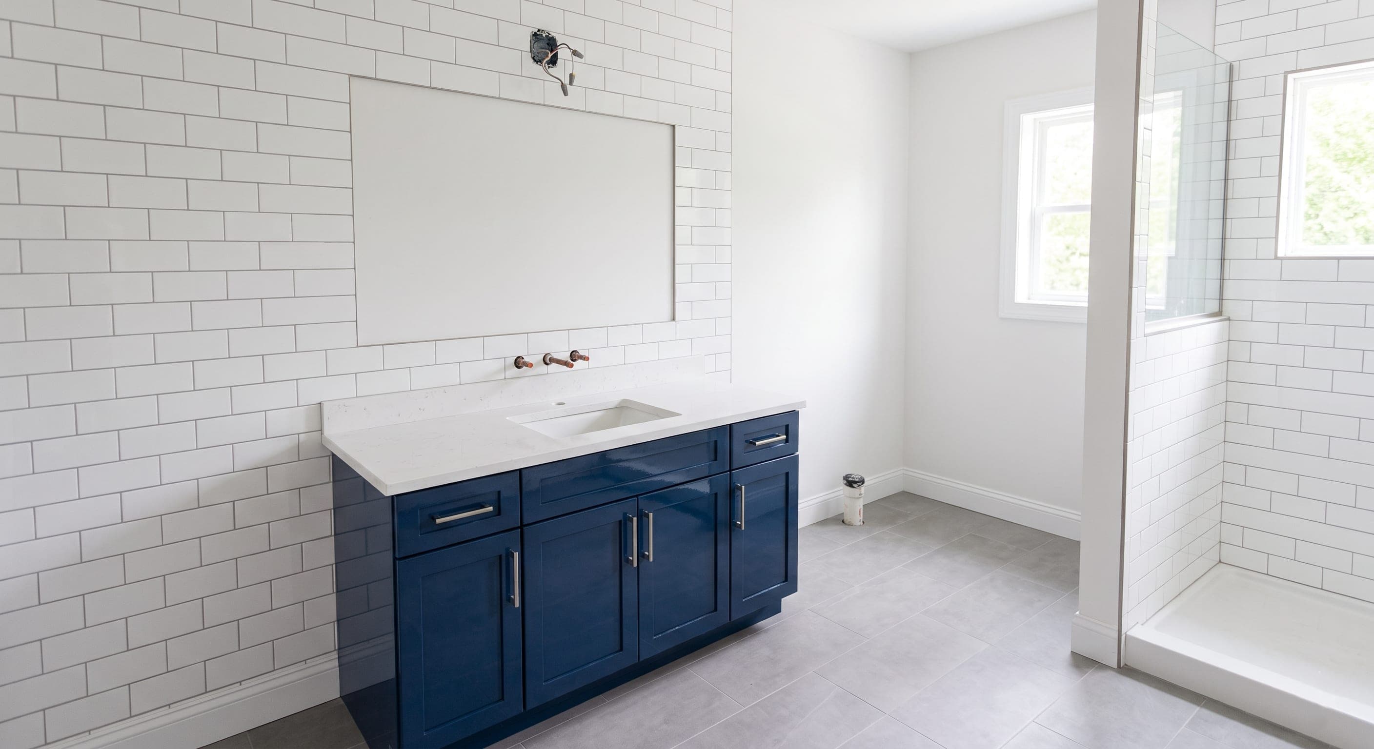 Vacant bathroom after post-construction cleaning with dust and debris removed