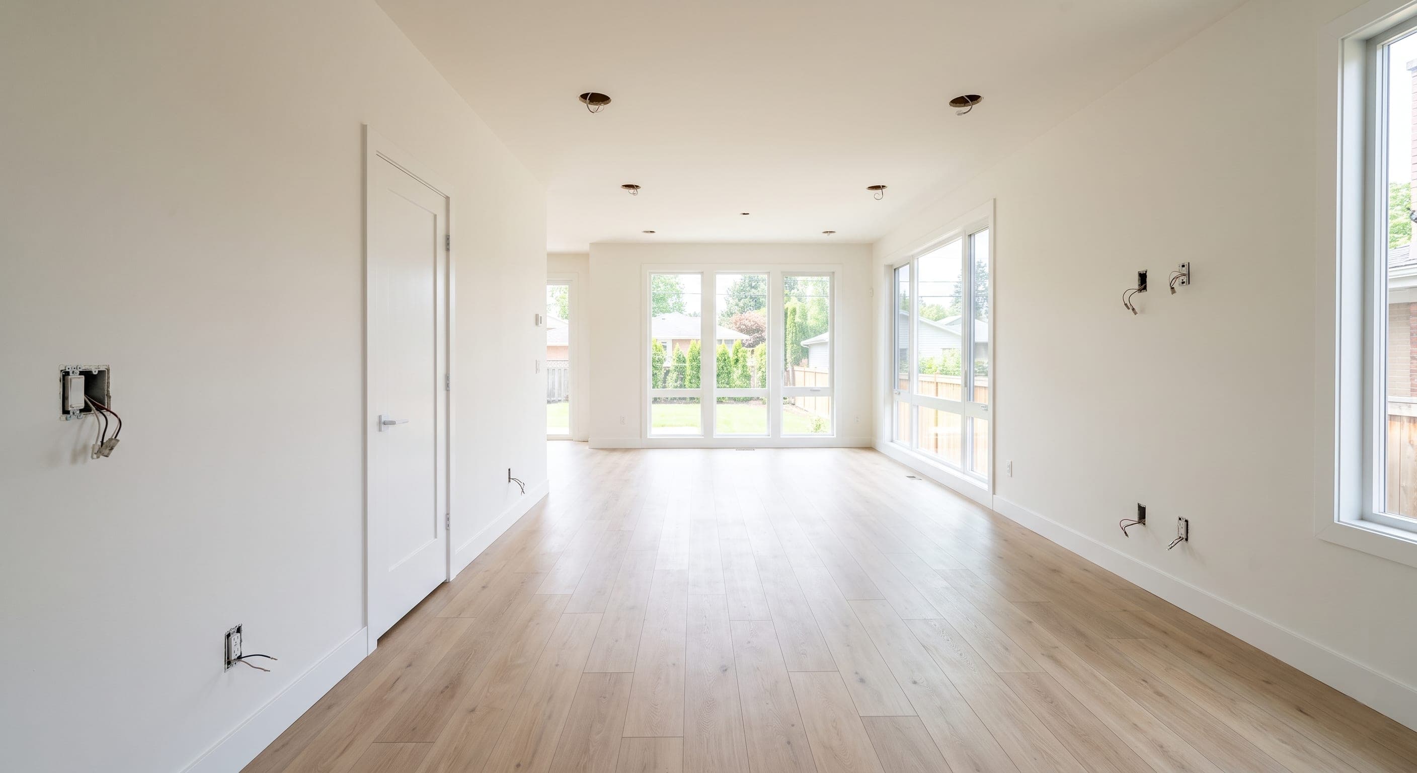 Vacant living space after post-construction cleaning with dust and debris removed